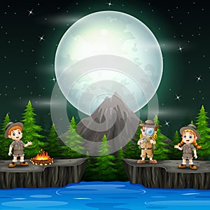 Three explorer children with campfire in the night scene