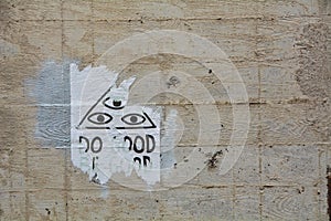 Three eyes on an alley wall in Corvallis, Oregon