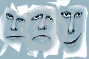 Three faces on grey