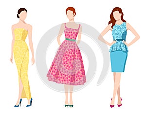 Three fashionable women wearing different fashionable dresses isolated on white background