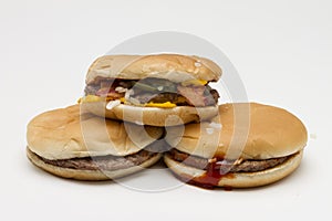 Three fast food hamburgers, horizontal