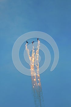 Three fighter jets in the sky