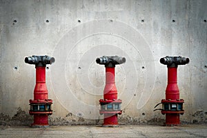 Three fire safety pump on cement floor of concrete building. Deluge system of firefighting system. Plumbing fire protection.