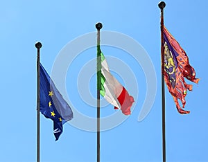 Three flags EUROPE ITALY and VENETO REGION with Lion photo
