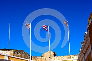 Three Flags flying over Castillo De San Felipe Del Morro photo