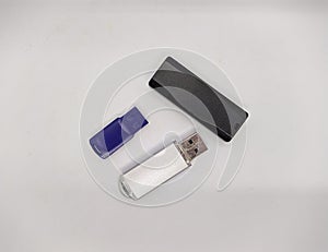 three flash drives. three USB flash drives on a white background top view