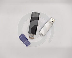 three flash drives. three USB flash drives on a white background top view