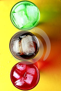 Three flavores of soda fizzy drinks