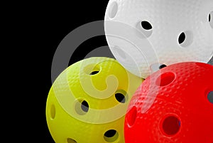 Three floorball balls isolated