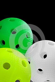 Three floorball balls isolated