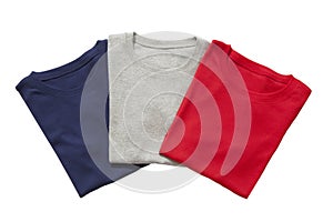 Three folded t-shirts isolated