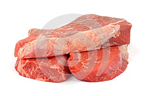 Three fresh beef chuck shoulder steaks