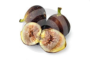 Three fresh figs fruit isolated on white background