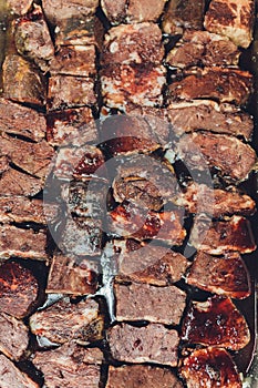 Three fresh raw Prime Black Angus Tenderloin beef steaks on stone background. Selected focus.