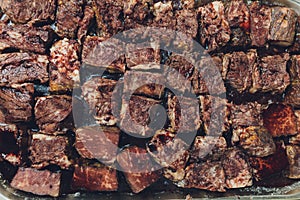 Three fresh raw Prime Black Angus Tenderloin beef steaks on stone background. Selected focus.