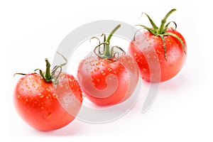 Three fresh red tomatoes