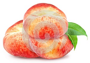 Three fresh ripe peaches with leaf.