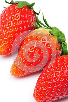 Three fresh Strawberries