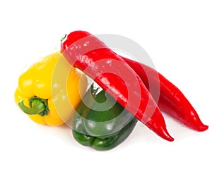 three fresh sweet pepper isolated on white background
