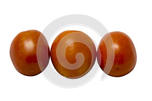 Three fresh tomatoes isolated on white background