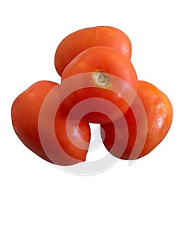 Three fresh tomatoes white background