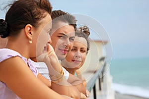 Three friends on balcony