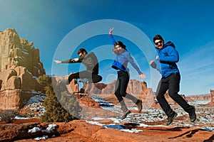 Three friends enjoying the Arches National Park freedome