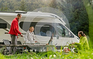 Three Friends Hanging Out on a Camping