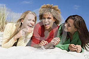 Three friends having fun at beach