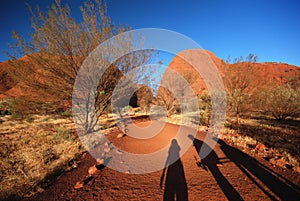 Three friends on the road to Kata Tjuta