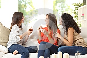 Three friends talking at home photo