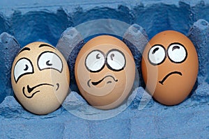 Three frightened egg face waiting cooking