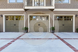 Three Garage door with windows photo