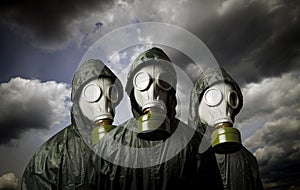 Three gas masks. Survival theme.