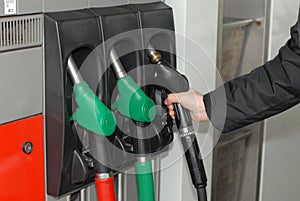 Three gas pump nozzles