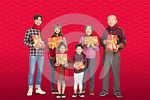 Three generation family celebrating chinese new year