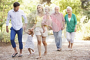 Three Generation Family On Country Walk Together