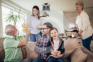 Three generation family spending time together at home