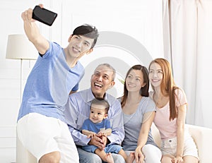 Three Generation Family taking selfie photo