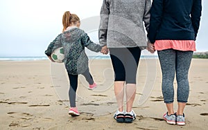 Three generations female watching the sea