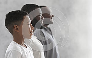 Three Generations Men. Profile Portrait Of African Boy, His Father And Grandfather