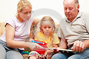 Three generations reading