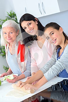 Three generations women baking together