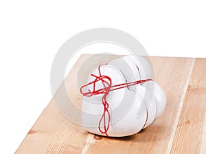 Three gingerbread hearts on wooden background