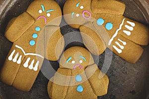 Three gingerbread man cookies