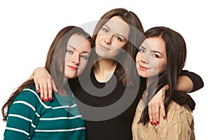 Three girlfriends on a white background