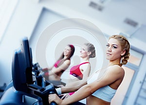 Three girls in fitness center