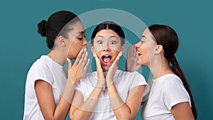 Three Girls Friends Gossiping Sharing Rumors Standing In Studio, Panorama