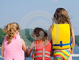 Three Girls on Front of Boat