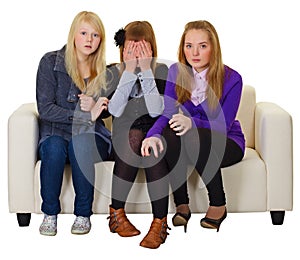 Three girls look a horror movie